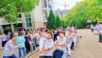 迎亚运、庆“五一”pp电子职工拔河比赛